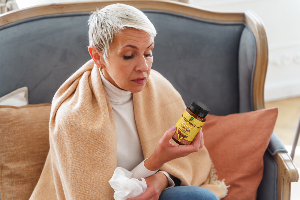 Woman Inspecting AHCC Complex Supplement